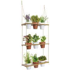 A 3 tier hanging planter that's perfect for trailing plants, you'll want this piece giving your garden a boost. Amazon Com 3 Tiered Hanging Planter Shelf With Pot Set Wood Floating Herb Garden For Kitchen Counter Vertical Succulent Hanger For Patio Porch Balcony Boho Plant Shelves For Wall Multi Tier Vertical Stand