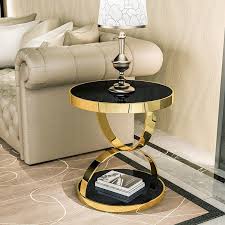 In our range, you'll find plenty of side or end tables to suit your taste. Luxury Modern Stylish 20 Black Glass Side Table Round Gold Metal Side Table With Circular Overlap Modern Stylish 20 Black Glass Side Table Round Gold Metal Side Table With Circular Overlap For Sale