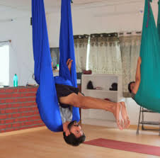 There are a variety of poses that you can do, some simpler, some more complex. Challenge Yourself Try Aerial Yoga Amex Essentials