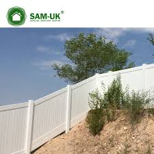 Iron fence installed on a gentle hill with stone underneath. 6 X 8 Vinyl Privacy Fence Double Gate On A Slope Hill From China Manufacturer Sam Uk