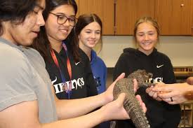 Scaly guest and science lessons meet at Emerald High