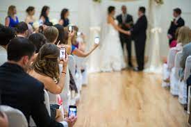 When you turn your phone sideways and get wide, you get more context in your photos. 23 Wedding Photos Ruined By Camera Phones Go Unplugged