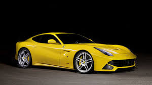 Wallpaper auto on the desktop, free pictures cars for the desktop, cars for the phone, smartphone in this section you will find thousands of wallpapers and photos with cars: Car Ferrari F12 Berlinetta Yellow Wallpaper 2560x1440 16388