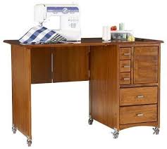John lewis' abacus desk would make a great sewing machine table. Home Wooden Sewing Machine Table Sewing Table Sewing Desk Sewing Machine Table
