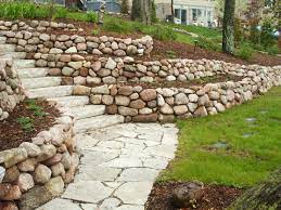 Terraced Fieldstone Retaining Walls In Mequon Wisconsin Stone Walls Garden Landscaping Retaining Walls Garden Retaining Wall