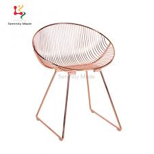 Wire dining chairs are gaining popularity now and you'll find them in different designs, shapes, and sizes. China Custom Made Rose Gold Metal Wire Dining Chairs For Coffee Shop China Metal Chair Wire Chair