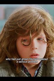 Whats The Name of The Movie That The Little Boy Has Like A Swerve of Hair