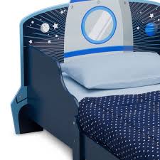 Create more play space with a bunk bed or trundle bed with storage drawers. Delta Children Space Adventures Rocket Ship Wood Toddler Bed