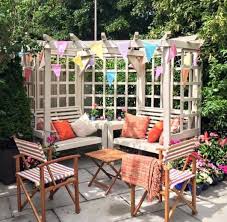 This beautiful seating option is the perfect item to bring to life any unused corner of your garden. Clementine Corner 4 Seat Garden Arbour Garden Furniture Cr101