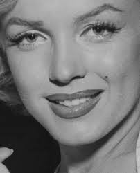 Marilyn Monroe with Peter Potter at the hand and footprint ceremony she  shared with her "Gentlemen Prefer Blondes" co-star Jane Russell at  Grauman's Chinese Theater, 1953. : r/MarilynMonroe