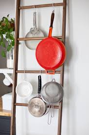 (those with apartments or smaller abodes will appreciate some of these trendy towel bars and hanging displays.) 5 Ways To Style A Leaning Ladder A Beautiful Mess