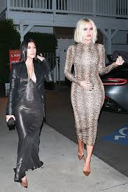 She is a media personality, socialite, and businesswoman. Khloe Kardashian In Bodycon Maxi Dress For Night Out With Sisters Hollywood Life