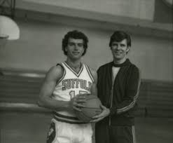 Suffolk University men's basketball coach James E. Nelson with a player,  1979-1980