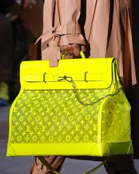 Black And White Louis Vuitton Duffle Bag Despite Sales Of Over 10 Billion Last Year Lvmh Cash Cow Louis Vuitton Could Have Grown More Indeed The Neon Bag Louis Vuitton Handbags Louis Vuitton Bag