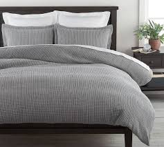 Climbing into a fort of sheets + covers to make your bed. Honeycomb Cotton Duvet Cover Pottery Barn