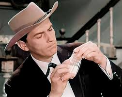 His voice sounded as if he had a mouth full of hot potatoes.