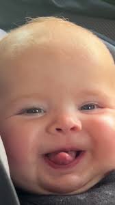 Adorable Baby Girl and Her Silly Tongue Antics in the Car