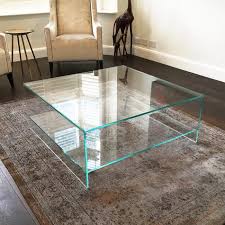 A tabletop is of clear bevelled glass. Modern Glass Coffee Table Contemporary Glass Coffee Table Klarity
