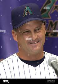 Arizona Diamondbacks manager Bob Brenly argues an eighth inning pickoff  call with second base umpire Marvin Hudson during the Diamondbacks 12-7  victory over the New York Mets, Sunday, Aug. 4, 2002, at
