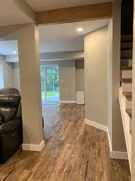 Basement Renovation Using Lifeproof Heirloom Pine Flooring House Flooring Flooring Rustic Basement