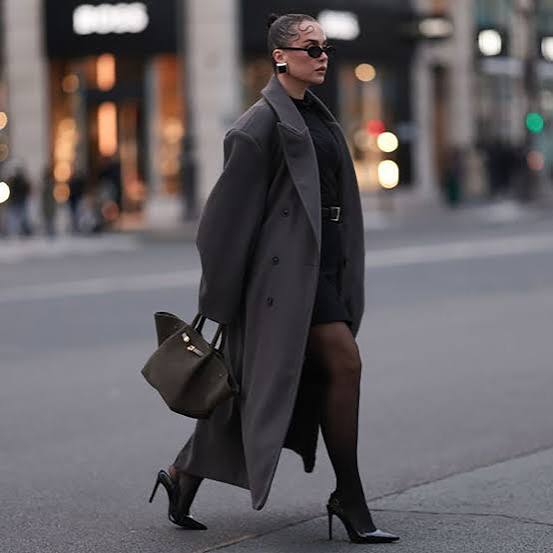 13 stylish ways to wear black tights with a dress for any occasion