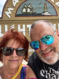 My hair is growing back after chemo. Leave it gray or go back to red? I  just turned 69.