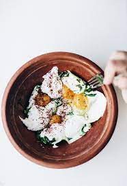 Ottolenghi Inspired Eggs Arugula With Garlic Yogurt At The Breakfast Table Brunch Recipes Food Pretty Food
