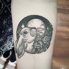 These fun tattoos are designed to look like cute bunny face features in blue, white, and gray colors. 55 Gorgeous Rabbit Tattoo Designs Designwrld