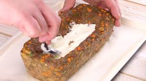 Complement meatloaf with this warm cheese and vegetable salad inspired by upscale pub fare. This Great Meatloaf Comes With Side Dishes Built In