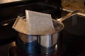 Make sure they're completely covered. Range Hood Cleaning Exhaust Fan Filter Degreasing Molly Maid