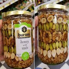 The Way All The Nuts Are Aligned In This Jar Of Honey Nuts Food Honey Jar Honey Nut