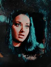 This image is a throwback family photograph of the Indian actor Mithun  Chakraborty with his wife, the former actress Yogita Bali, and their  children. The people in the photo are: Mithun Chakraborty: