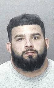 Man surrenders, faces multiple charges