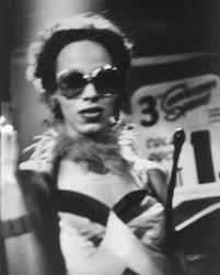 Bea with a whip at The Other Side, 1973