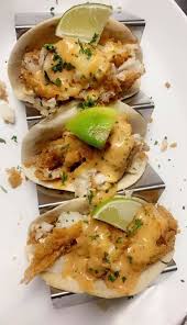 The tortilla is then folded around the filling and eaten by hand. Tap 22 Fish Tacos Or Tin Can Nachos Facebook