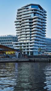 Vacuum collectors on the roof, using a heat. Licht Wohnen Marco Polo Tower Hamburg
