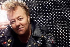 Are there any Christian rockabilly artists like Brian Setzer?