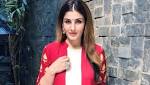 against Raveena Tandon over photo