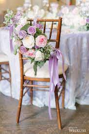 Lavender weddings, elegant wedding ideas, cocktail table décor, wedding centerpieces, wedding centerpiece ideas, lavender. A Lilac Hued Wedding Inspired By The English Countryside Wedluxe Media Wedding Chair Decorations Wedding Chairs Lavender Wedding