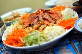 Yee sang, also known as yu sheng (魚生) is a traditional dish for chinese during chinese new year which symbolises prosperity, abundance and a new beginning. Yu Sheng Or Prosperity Toss A Fun Chinese New Year Tradition Indoindians Com