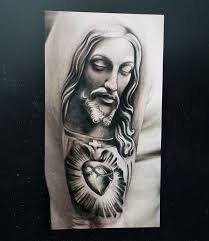 The holy grail is prominently featured between jesus and mary. Jesus Christ Tattoo On Arm