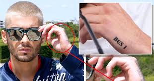 Zayn malik tattoos 3058 gifs. Is Zayn Malik Getting His Bus 1 Tattoo Removed Star S Ink Has Faded Mirror Online