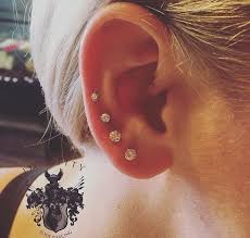 quadruple ear piercing we are open 7 days a week to make you sparkle ear piercings piercing body jewelry