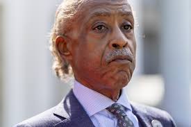 Sharpton's stern eulogy