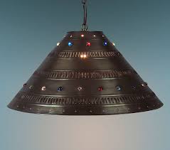 Light will shine through the holes, highlighting the punched design. Extra Large Punched Tin Hanging Shade With Marbles