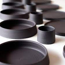Atelier Helga Ritsch Here They Are Black Porcelain Plates Bowls And Cups Hand Thrown No Glaze Sanded Ceramic Tableware Ceramics Ceramics Ideas Pottery