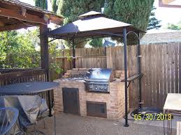 Most bbq grills come with a little deck area for setting food, but having a beautiful counter area for meal preparation will make a big difference with how much more efficient you a buffet area built of a foundation of stone or other beautiful outdoorsy material adds a more natural look to your grilling area. Build Your Own Backyard Grill Gazebo Diy Grill Gazebo