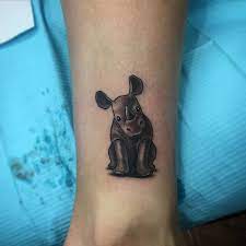 28 Creative Rhino Tattoo Designs And Ideas Tattoobloq Rhino Tattoo Body Art Tattoos Special Tattoos
