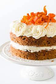 A delicate swiss dot pattern decorated the single tier carrot cake. Moist Carrot Cake With Pineapple Cupcake Project