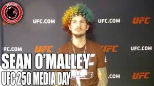 Sean o'malley enjoys a good game of mental warfare, but he claims that wasn't his intention when dyeing his hair the colors of his upcoming opponent's home country. Sean O Malley Explains Insane New Rainbow Hair Ufc 250 Media Day Youtube